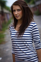 Fototapeta premium portrait of a cute girl in a t-shirt on the street
