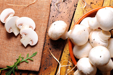 Freshly picked mushrooms on a table in the field top view