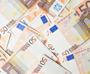 Multuple fifty euro bank notes
