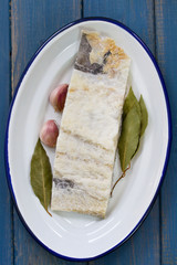 salted cod with garlic on dish