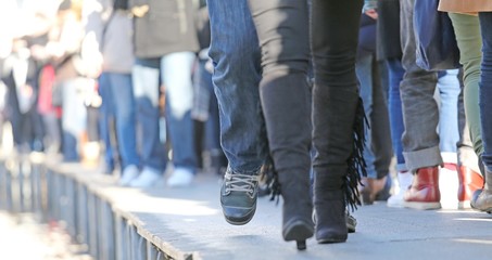 People walking on the catwalk in Venice Italy