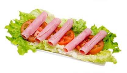 Ham rolled on salad on white background