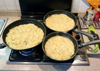 three pan with potatoes and cheese recipe typical of Italy