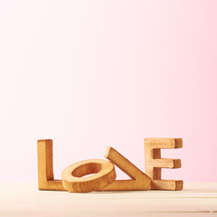 Love composition of wooden letters