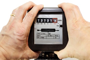 two hands shaking with anger the counter of electrical consumpti