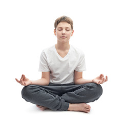 Young boy meditating