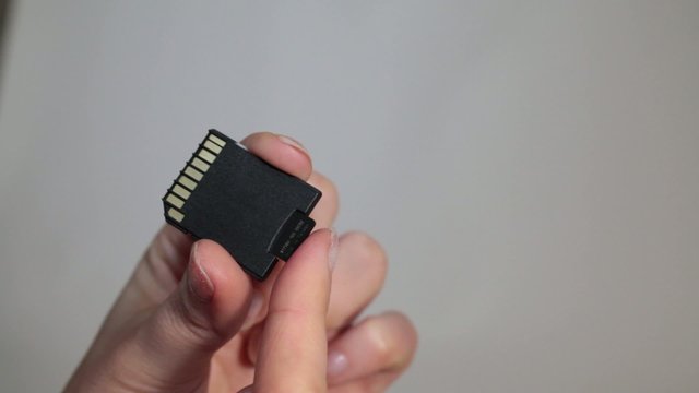 Sliding MicroSD Card Into MiniSD Adapter