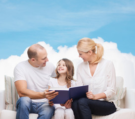 happy family with book at home