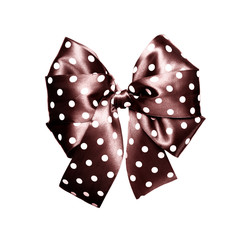 dark brown bow with white polka dots made from silk