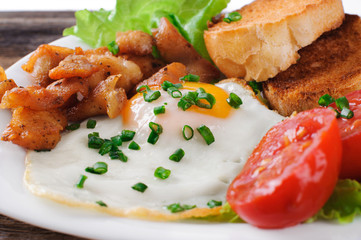 Breakfast. Snack. Eggs, chicken and tomatoes.