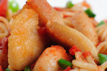Pasta. Spaghetti with sauce and chicken. Macro. Close up.