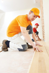 parquet workers at flooring work