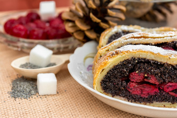 Poppy seed strudel with cherry
