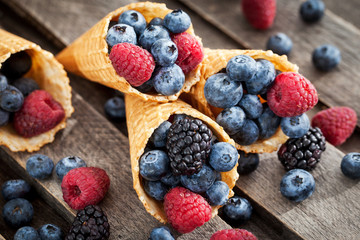 Fresh berries in waffle cone