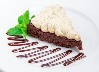 Chocolate cake  with chocolate creame on white background