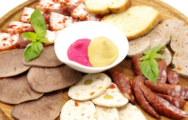 plate of sausage and bacon on white background