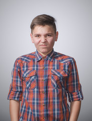 Fototapeta premium Teenager on gray-white background