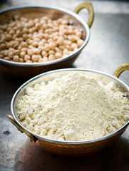 Flour from chick-pea in the Indian copper bowl