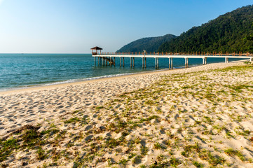 Beautiful tropical beach with jetty