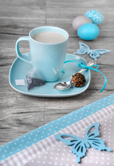 Cup of tea and Easter decorations