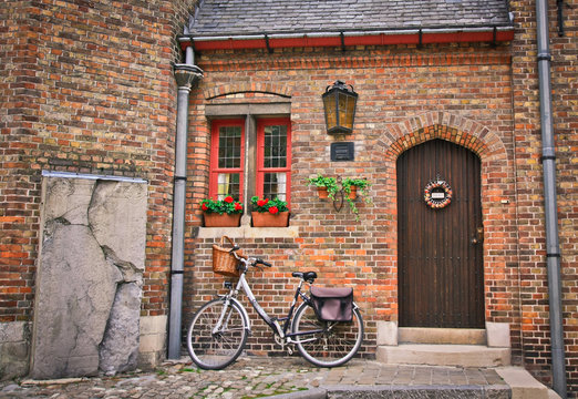 The bike near door of the old house