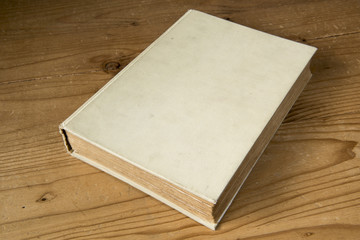Fototapeta premium Old antique yellowed book with no title on it