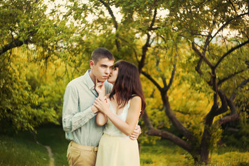 A young couple that is about to kiss