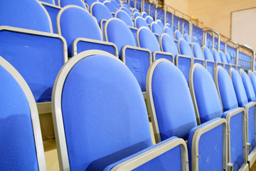 Fototapeta premium Blue stadium seats hall handball