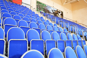 Obraz premium Blue stadium seats hall handball