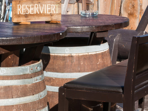 Reserved barrel shaped table in mountain chalet