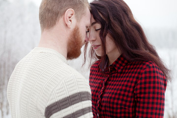 loving couple hipsters winter outdoors