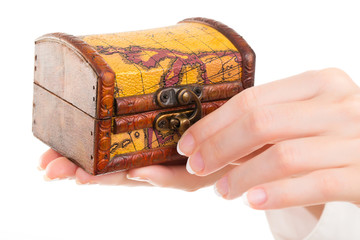 isolated open mysterious chest in woman hand