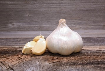 Garlic on wooden background