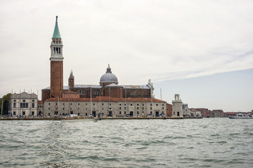 Fototapeta na wymiar San Giorgio Maggiore and water traffic in summer Venice
