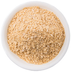 Whole grain breakfast cereal in a white bowl