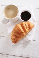 fresh baked croissant with coffee