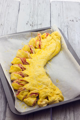 Savory pie with bacon and soft cheese