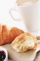 fresh baked croissant with coffee