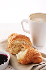 fresh baked croissant with coffee