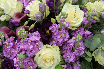 Purple and white bridal arrangement