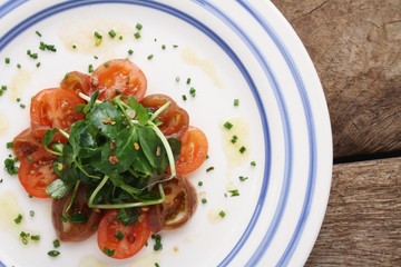 plated tomato and watersress salad