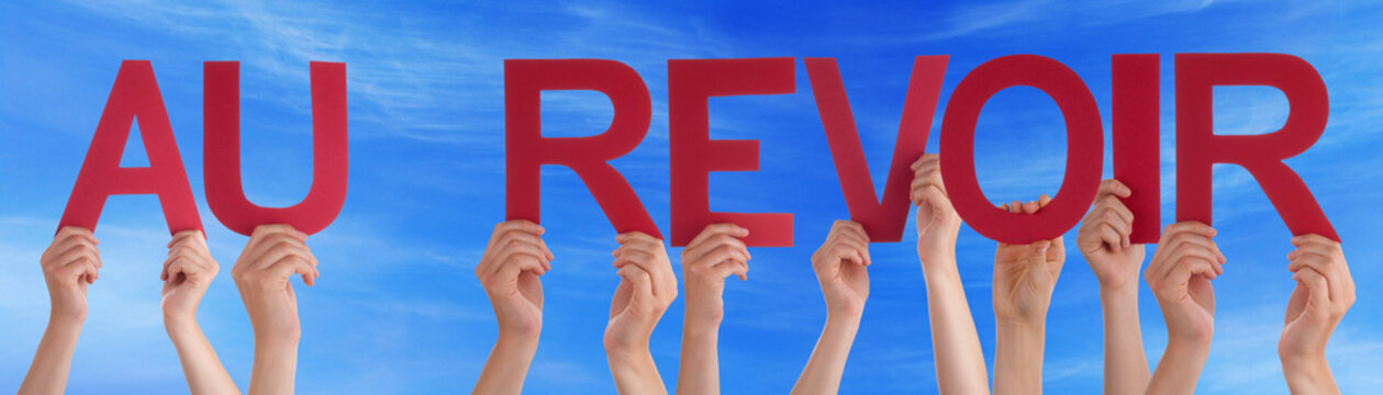 People Holding Straight French Word Au Revoir Means Goodbye Sky