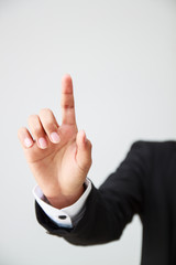 business man pointing finger for advertising or presentation