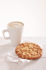 cuppucino coffe with cookie
