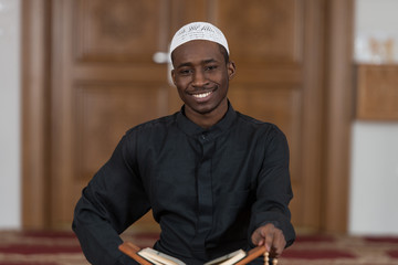 Portrait Of Young Muslim Man Smiling