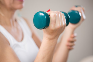 Elbow flexion with dumbbells