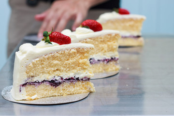 milk cake with topping strawberry.