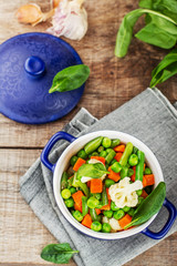 Assorted vegetables with spinach leaves
