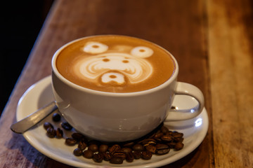 coffee cup detail in wooden table