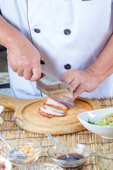 chef sliced red pork